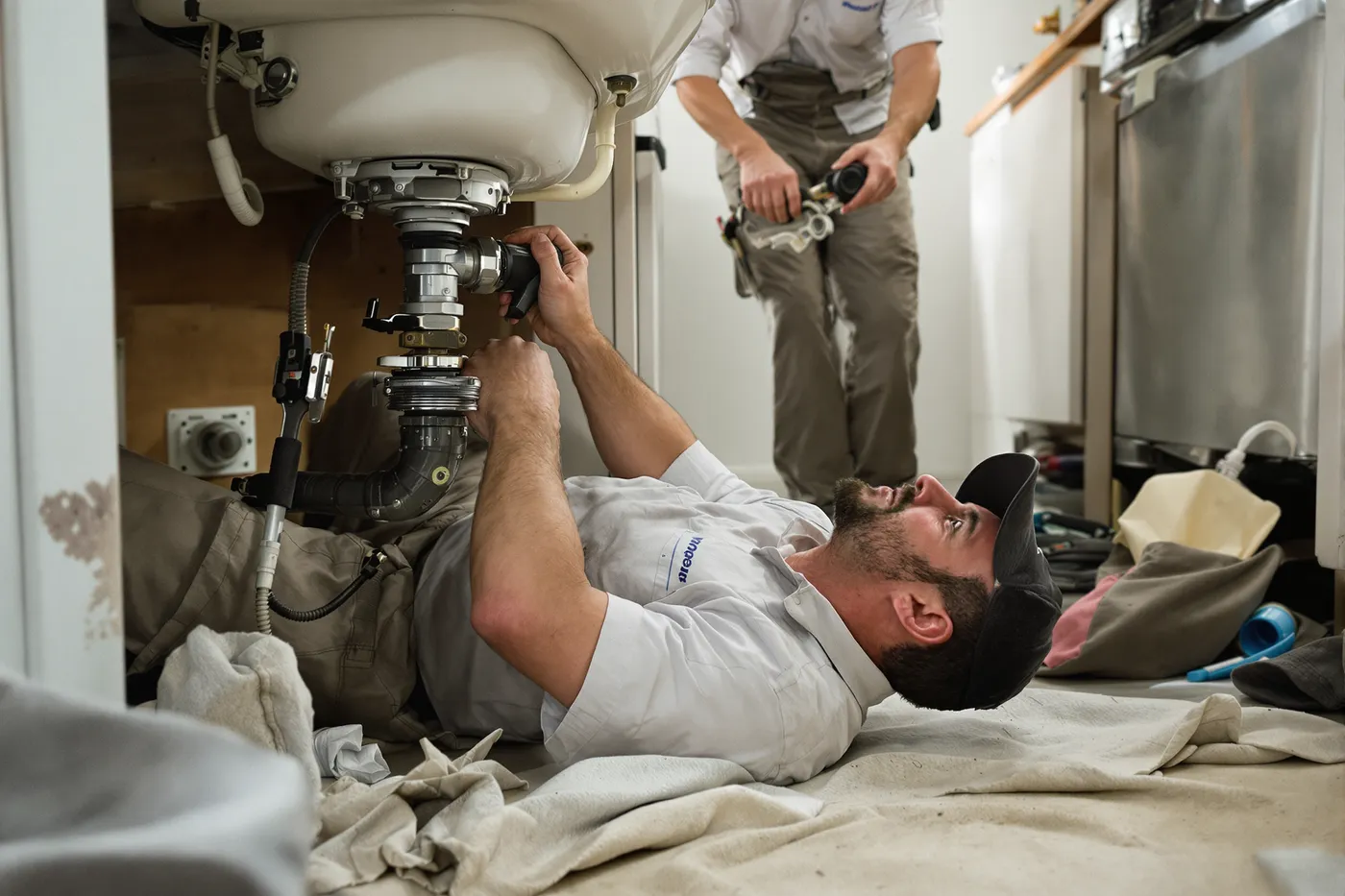 A plumbing crew on the job in the market you would own.